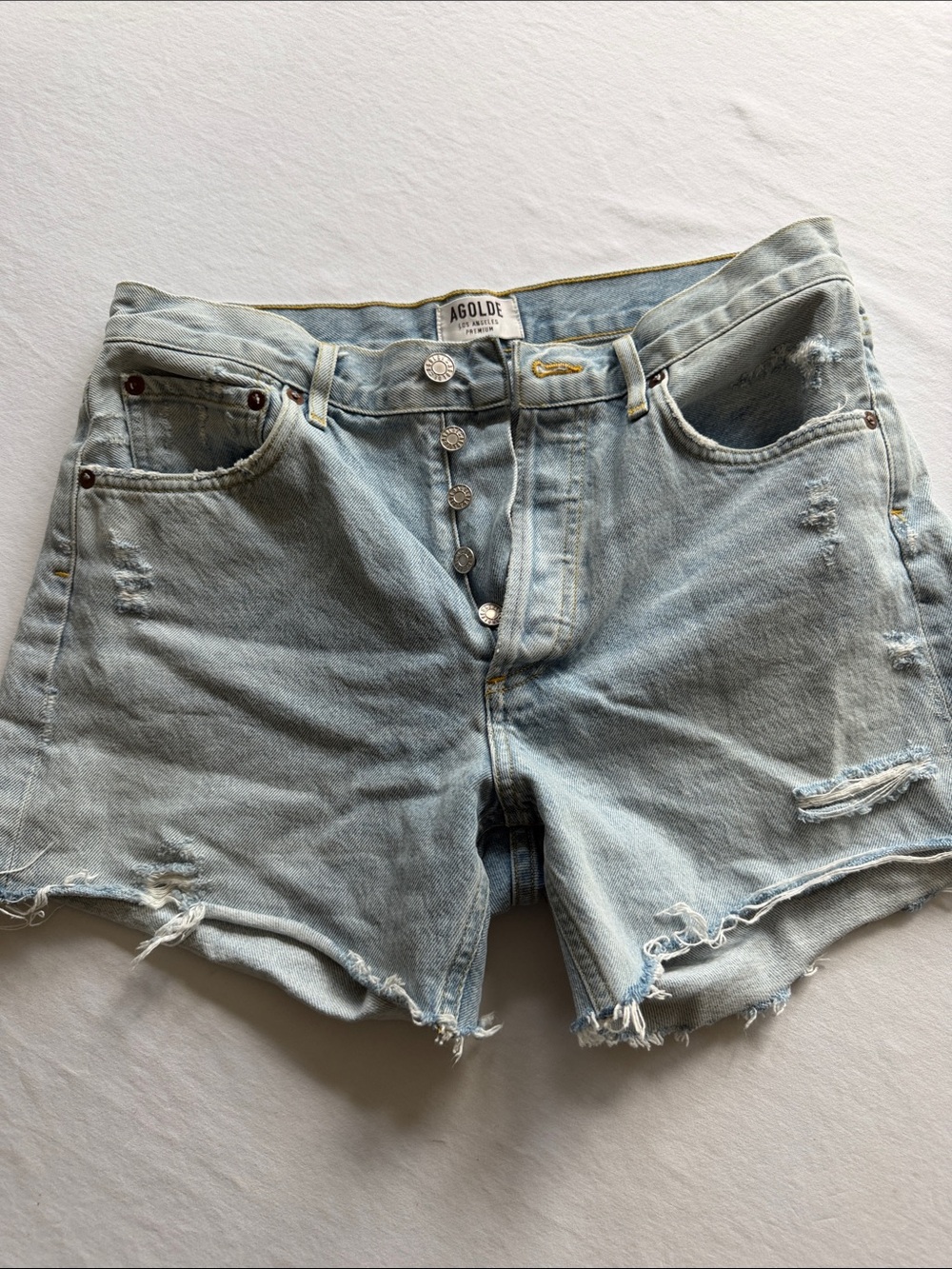 Agolde Light Wash Distressed Denim Cutoff Shorts